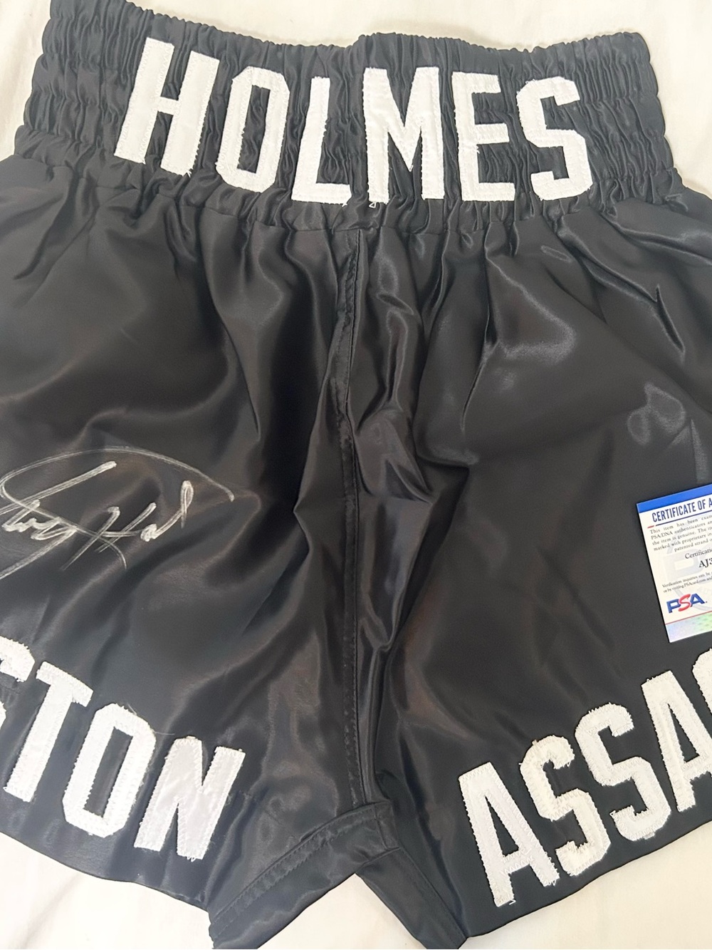 LARRY HOLMES  HOF SIGNED BOXING TRUNKS PSA COA
